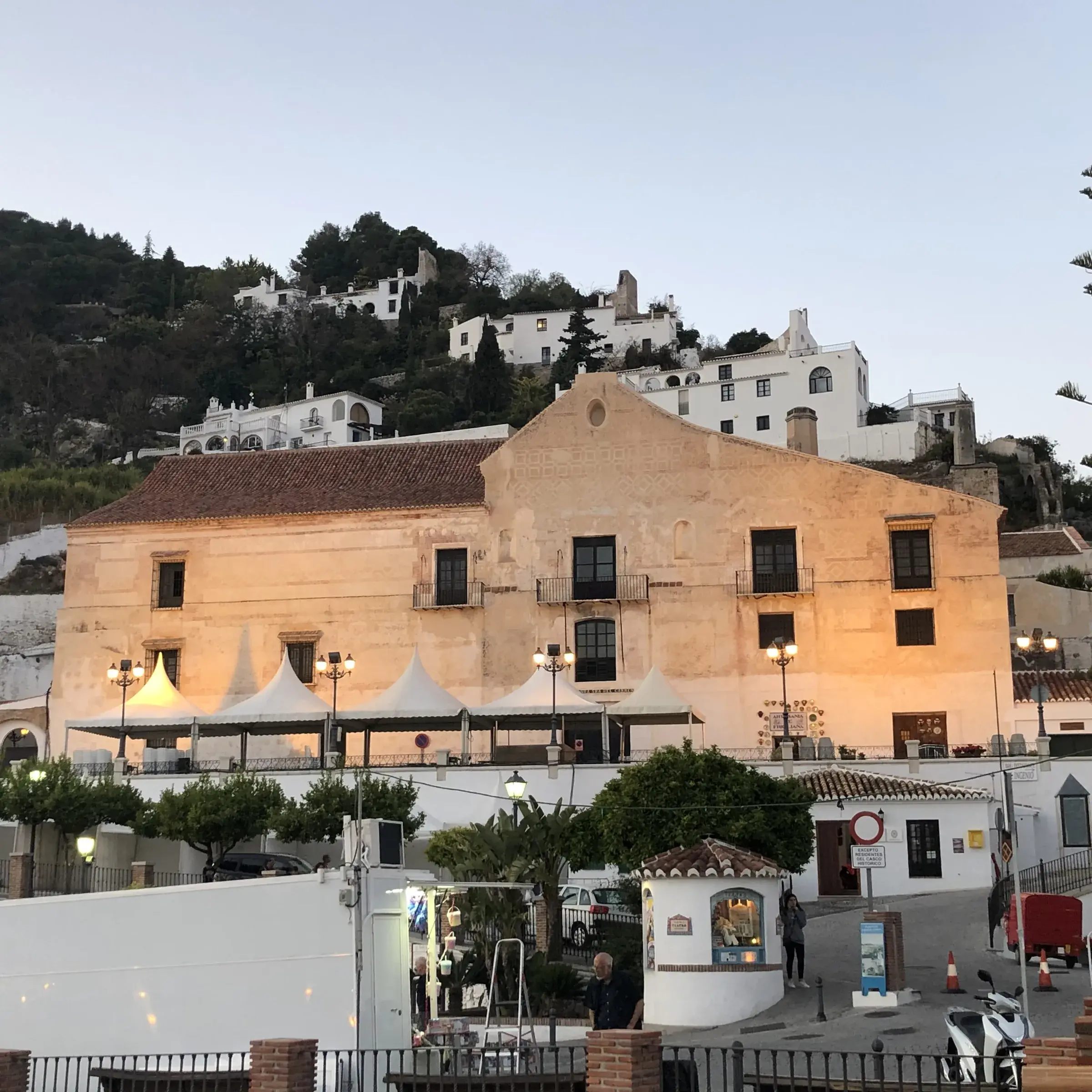 The plaza in front of Casa del Apero in Frigiliana on a bright spring day, where the cane honey festival is held.